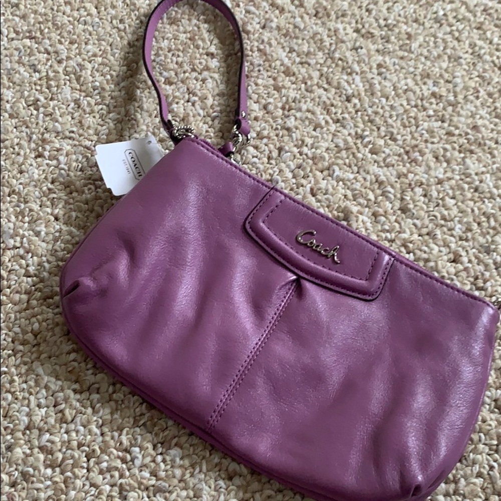 New with tags Coach wristlet ! Purple. Large